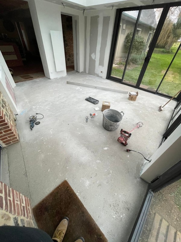 Une véranda métamorphosée avec un carrelage sur mesure